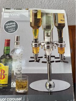 Liquor bottle rotating shooter