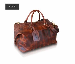 LEATHER SIDE PUNCH DUFFLE BAG | AB