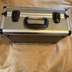 CASE, METAL  16"w x 10"deep x 7"high; cross streets are Arapaho & Waterview