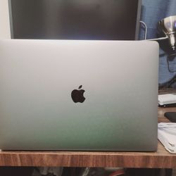 15in MacBook Pro Laptop. Core i7, Radeon Pro Graphics, 16