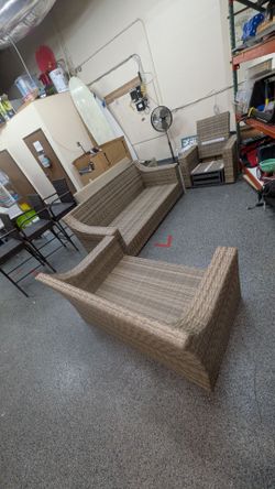 Outdoor Wicker Patio Sofa and Chair Set. **No cushions**. Aluminum frame will never rust