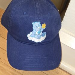 Care Bears Grumpy Hat Sitting On Cloud With Star In Hand UNISEX OSFM 