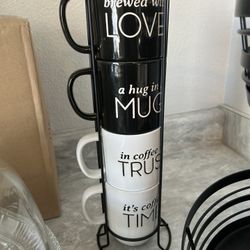 Set Of Four Mugs And Holder