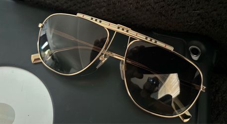Burberry Dean  gold pilot sunglasses with dark gradient lenses and signature check pattern detailing on the top brow bar