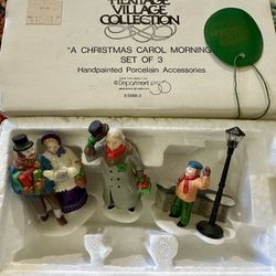 Dept. 56 Heritage Village Collection – Village Accessories “A CHRISTMAS CAROL MORNING” – Set of 3 Hand-painted porcelain. 