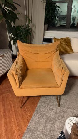 2 arm chairs and a coffee table