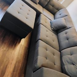 Grey Sectional Couch With Cups Holders 1 year Old Barely Used!!