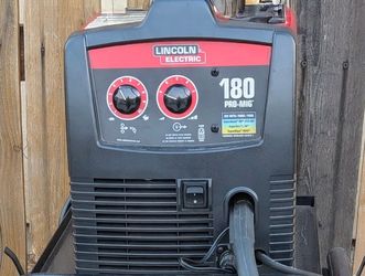 Welder with cabinet, helmet, torch kit