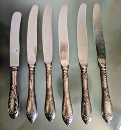 Silver plated knives like new 6 piece