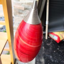 Pendant light in red.