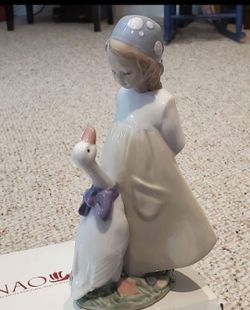 NAO by Lladró Girl with Goose Porcelain Figurine