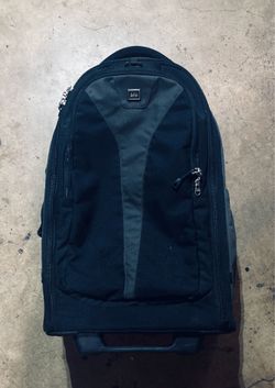 REI rolling carry-on/backpack hybrid luggage