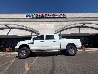 Dodge Ram wheels tires leveling and lift kits accessories lights side steps bed covers installations. Alignments. (we Finance)