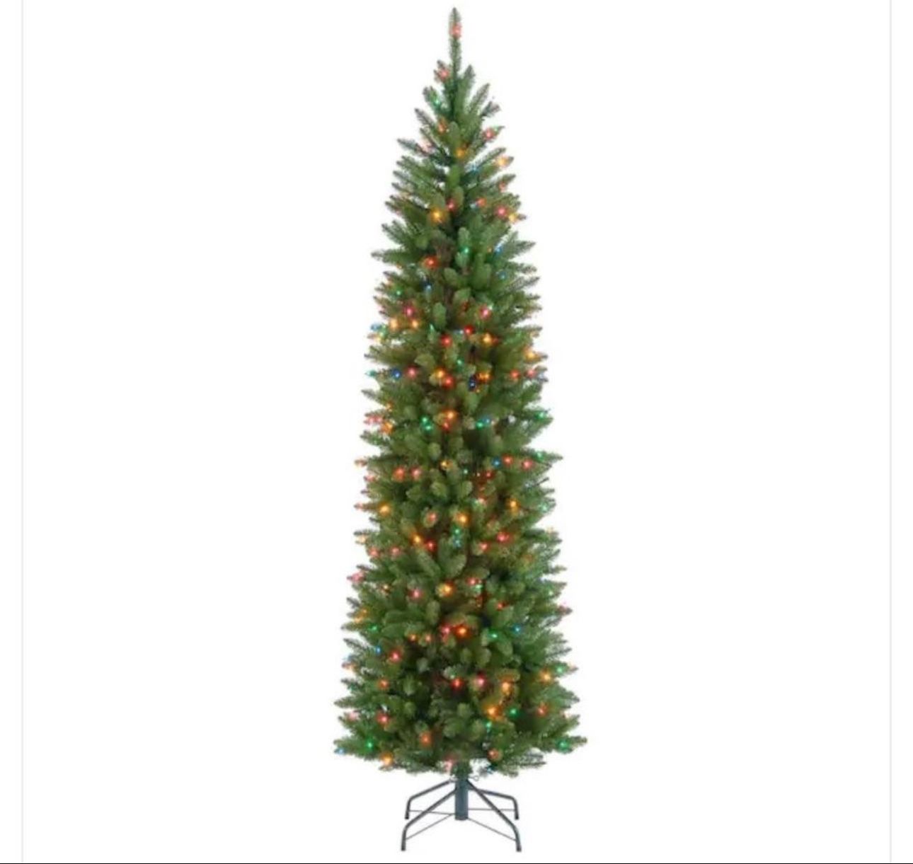 New 6.5 ft. Artificial Christmas Tree with Multicolor Lights. New in the box.