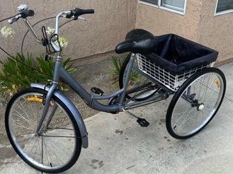 Gray 7-Speed Folding Adult Tricycle features a cargo basket and a large, comfortable seat.
