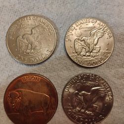 3 1dollar Coins And 1 Bison