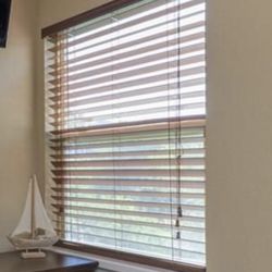 7 sets of wood blinds