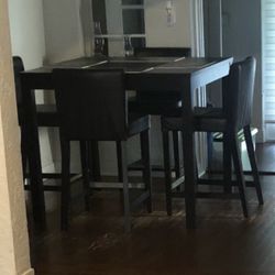 Dinner table with 4 stools $200