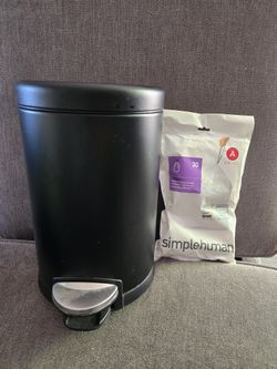 Simple Human Black Trash Can