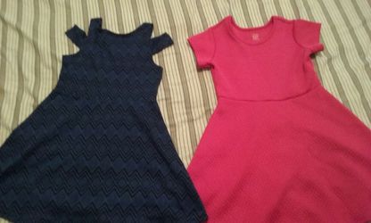 Selling 2 girl dresses 7/8 and 8/10