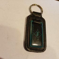 Vintage Leather Keychain With Ring And Emblem On The Leather Saying Arnold Auto Center Apache Junction Arizona