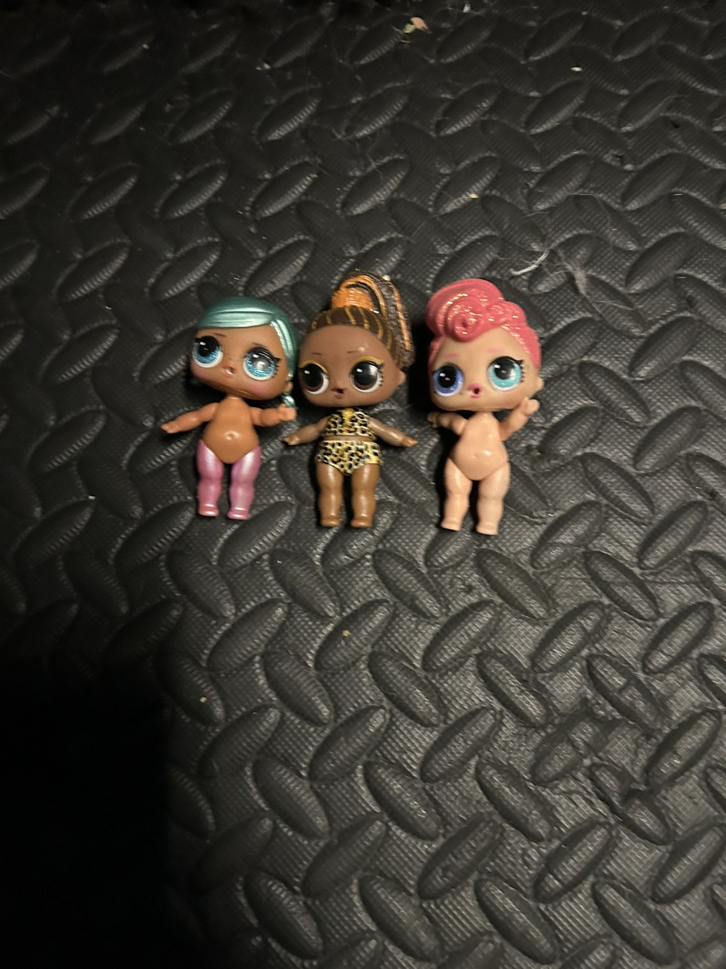 Three lol dolls