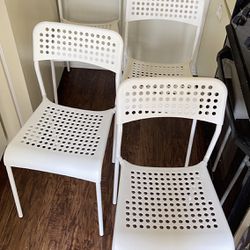 4 IKEA ADDE Chair, White steel Durable BRAND 15.15” L 15.75”W 18.11”H stackable save space”