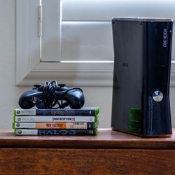 Xbox 360 S w/ Rock Band Controller and games