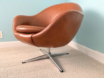 Vinyl mid-century modern swivel chair