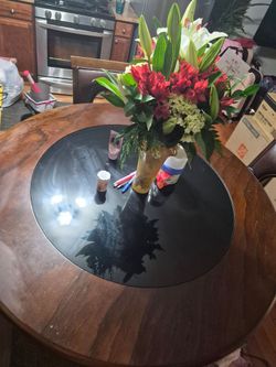 Round glass table with 4 chairs, book shelf and shoe stand