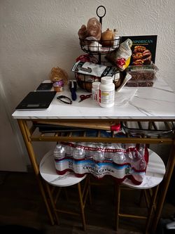 Bar style table with two stools