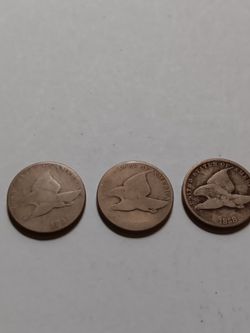 Vintage coins. Very old. 1857 & 2  1858’s Flying Eagle Cents