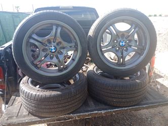 4 yantas con rines de un carro BMW