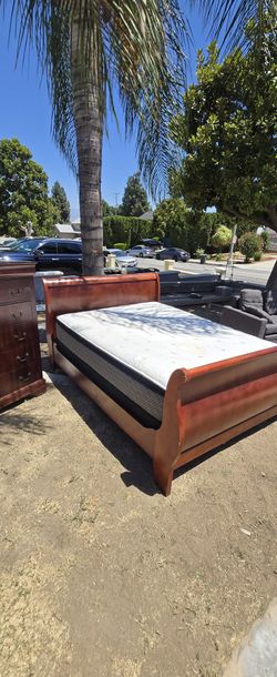 Bed And Dresser.