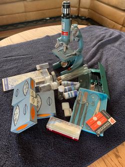 Vintage Scope Zoom student microscope with accessories.