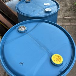55 gallon Plastic Drums clothes top $20 each