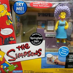 The Simpsons "DMV & Exclusive Selma Bouvier" WORLD OF SPRINGFIELD - Playset & Interactive Figure (Playmates)
