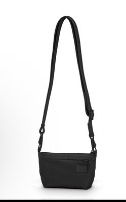 Pacsafe black cross-body bag shown is the Pacsafe Citysafe CS- series Anti-Theft Cross Body & Hip Purse,