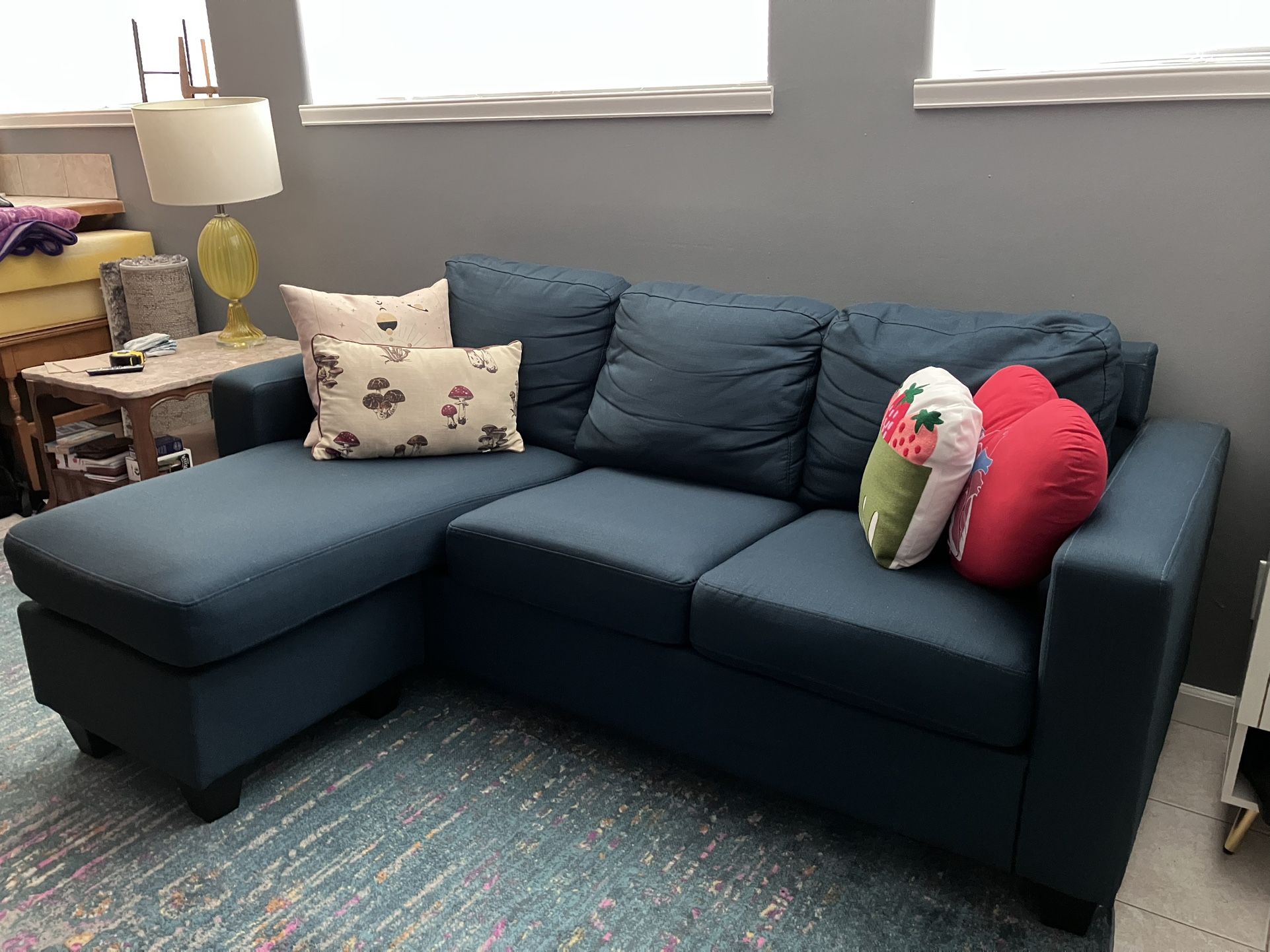 Comfy compact blue couch