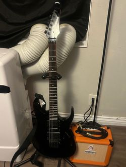 Ibanez RG guitar with Orange amp and case
