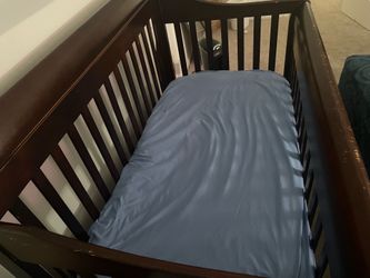 FREE Brown Wooden Crib