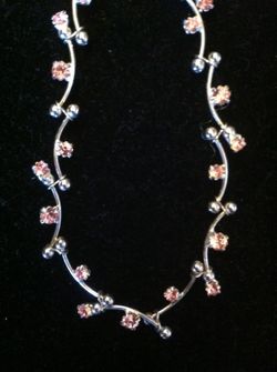 Fashion silver necklace with pink crystals