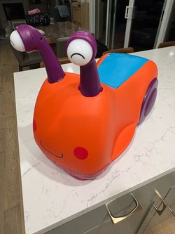B. toys Buggly-Wuggly Ride-On Snail