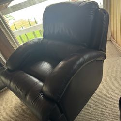 Leather (faux) reclining & rocking chair Only $265.  