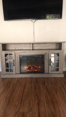 Tv stand with fire place