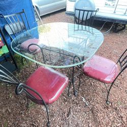 OUTDOOR GLASS TOP TABLE AND CHAIRS 