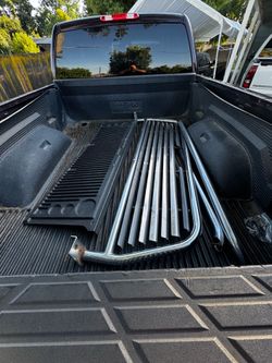 Bed liner and window rack for dodge ram
