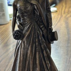 Genesis Just Married, a delightful 9.5 inch ornament made of cold cast bronze.