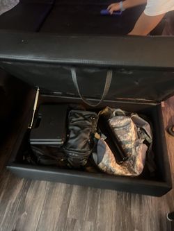 Black Leather “L Shaped” Sofa.