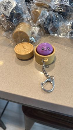 LED light up dumpling in dumpling basket keychain